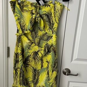 Colorful yellow dress. Tie in front is removable. VERY STRETCHY